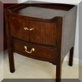 F40. Pair of nightstands with fluted cabinet doors. 27”h x 28”w x 18”d  